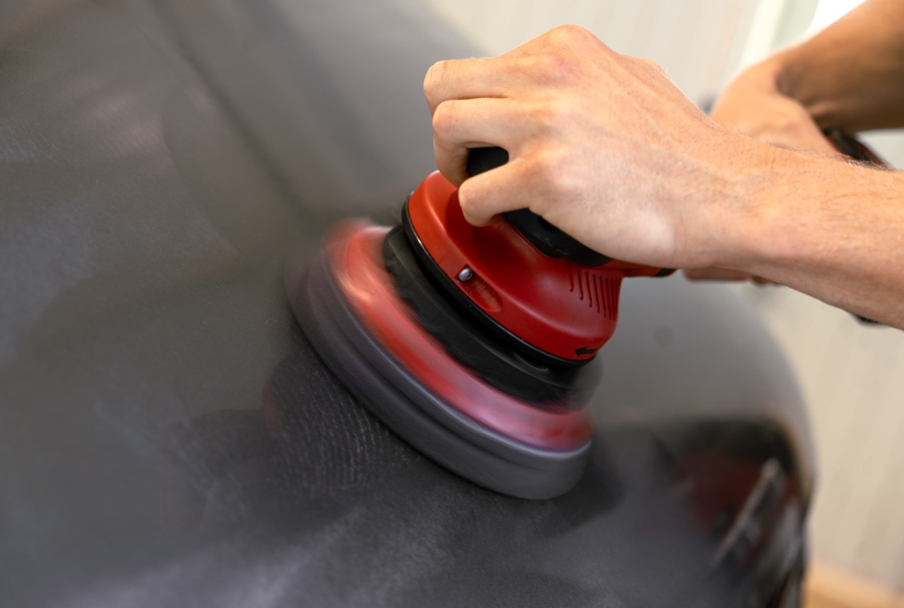 workman-in-hazmat-suit-cleaning